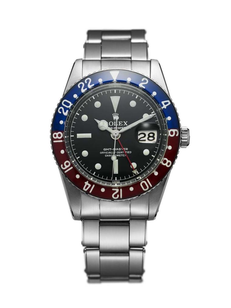 The Rolex GMT-Master watch from 1955 was specifically designed for Pan Am pilots who crossed multiple time zones. Also known as the Pepsi watch because of its red and blue rotating 24 hour bezel, the Rolex GMT-Master is one of Rolex' most sought-after wat
